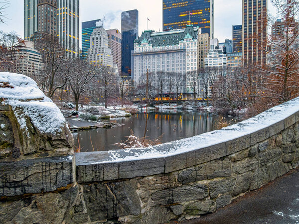 Gapstow Bridge in Central Park on snowy morning after storm