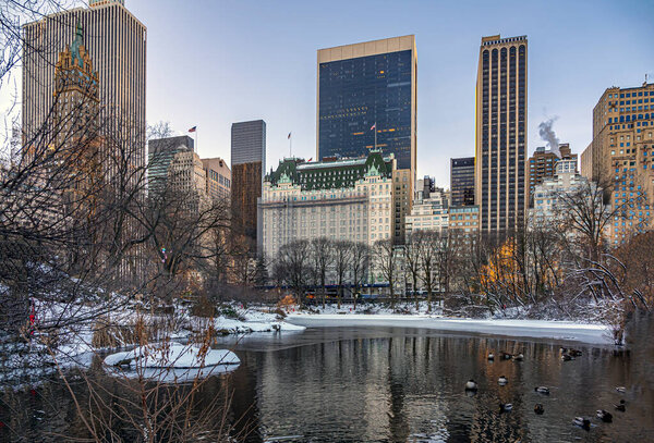 Plaza hotel on he edge of Central Park, New York City after snow strm in early morning