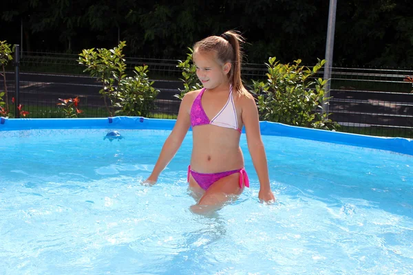 Baby in the swimming pool — Stock Photo, Image