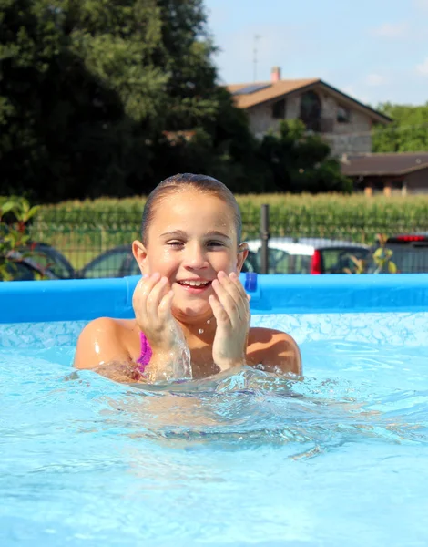 Baby in the swimming pool — Stock Photo, Image