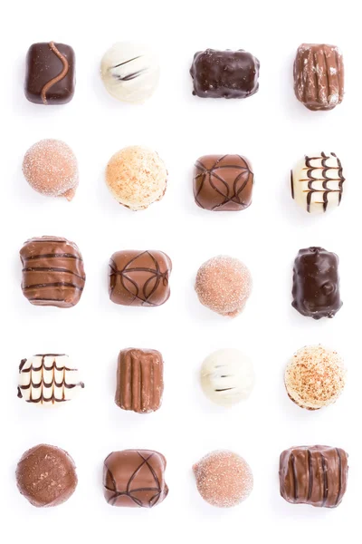 Chocolates sobre branco — Fotografia de Stock