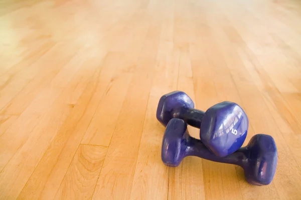 Dumbbells in gym — Stock Photo, Image