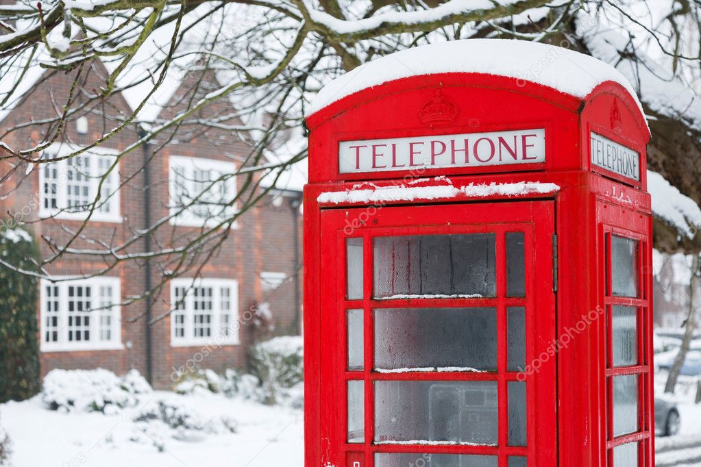 Telephone box with snow