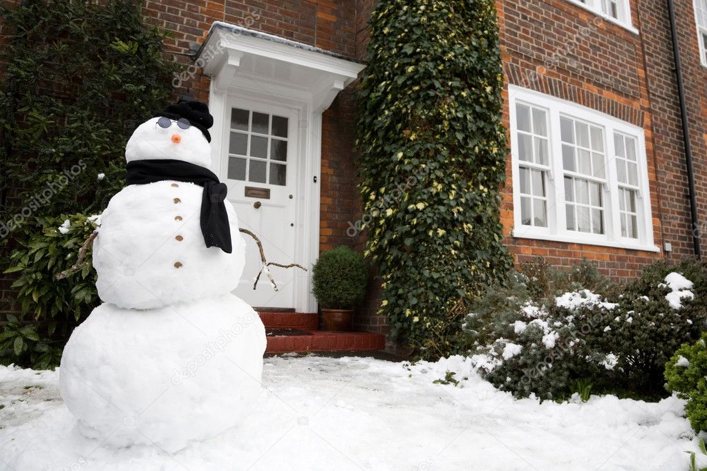 Snowman and house