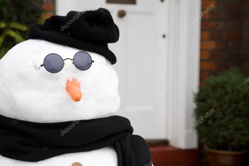 Snowman at front door