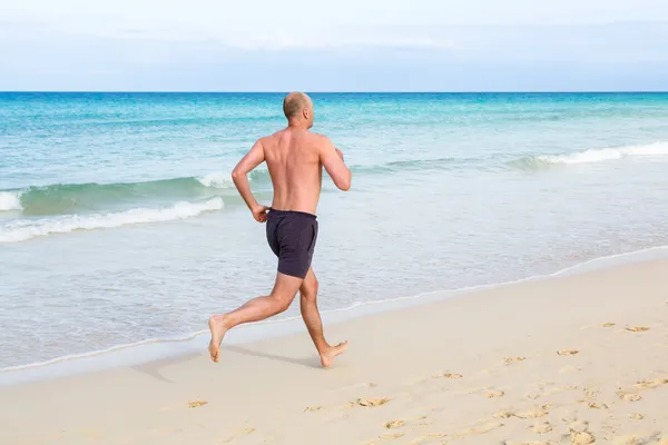 Middle aged man running — Stock Photo, Image