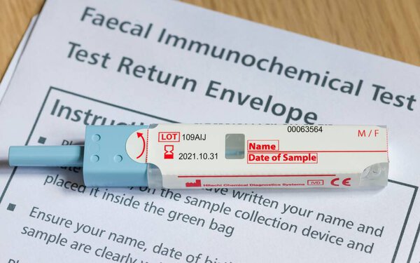UK - April 21, 2021. Closeup of FIT test (faecal immunochemical test), a fecal occult blood test for screening bowel cancer