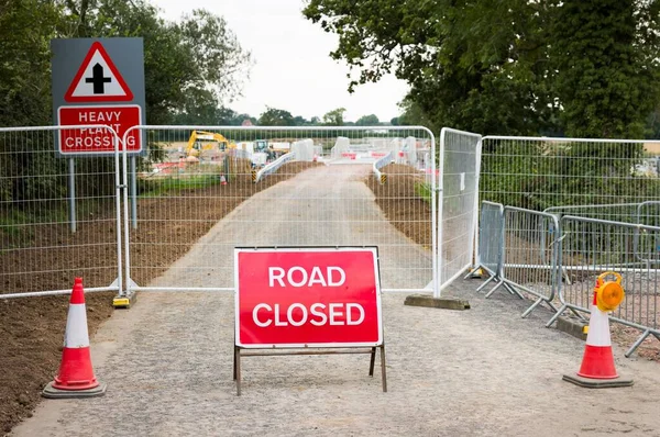 Road closed sign. Country road closed to rebuild a railway bridge as part of the East West Rail project