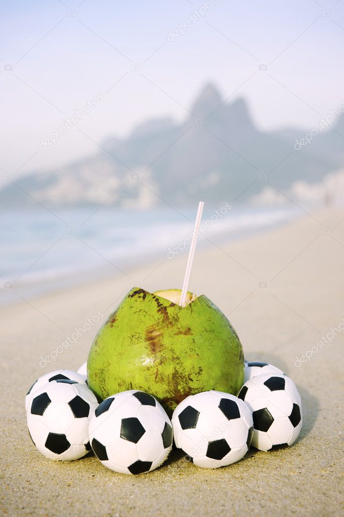 Fresh Coconut with Football Soccer Balls on Beach in Rio