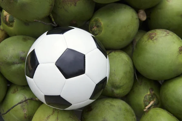 Soccer Ball Football Resting with Fresh Green Coconuts — Stock Photo, Image