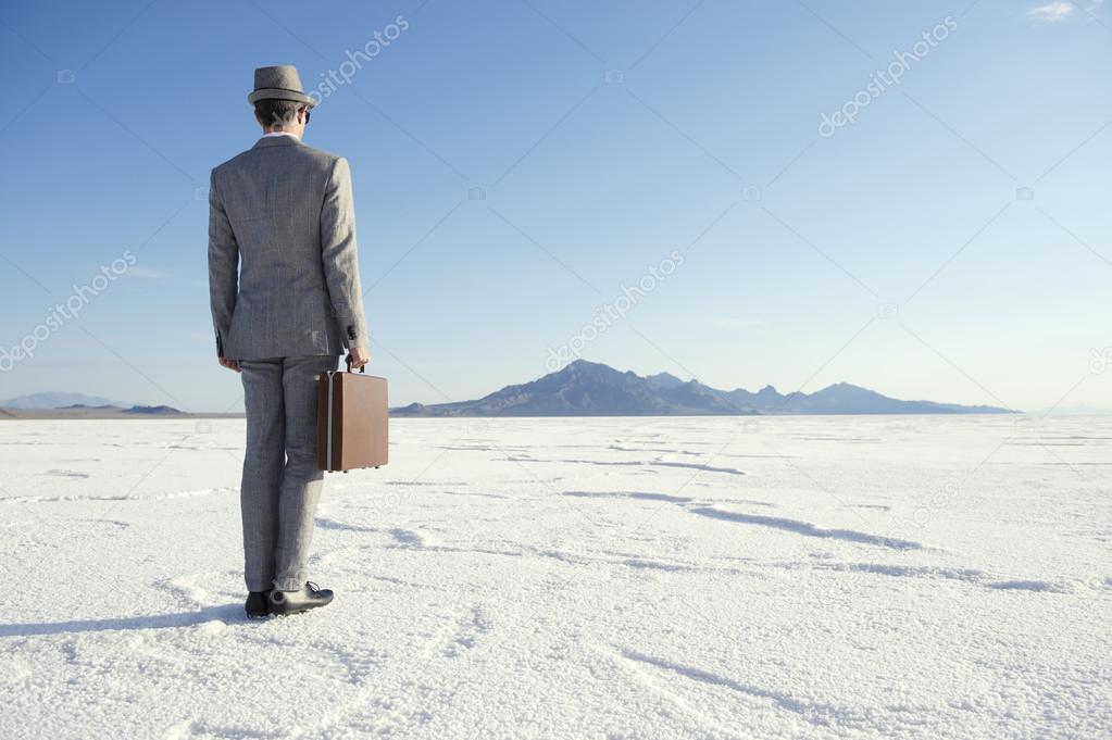 Traveling Businessman Standing with Briefcase