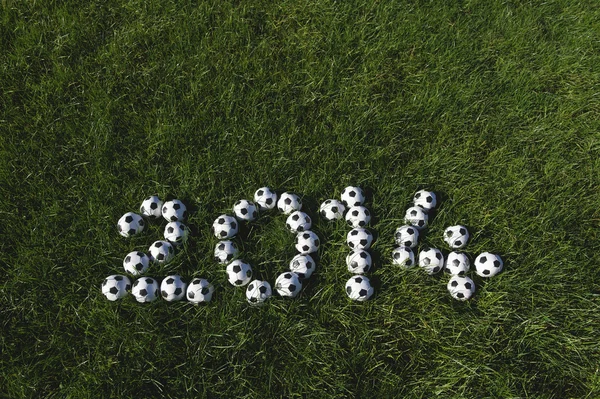 Mensagem para 2014 feita com bolas de futebol — Fotografia de Stock