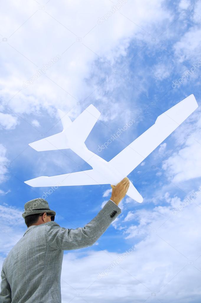 Entrepreneur Businessman Holds White Airplane In Sky