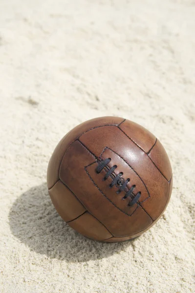 Vintage Brown Football Soccer Ball Sand Beach Background — Stock Photo, Image