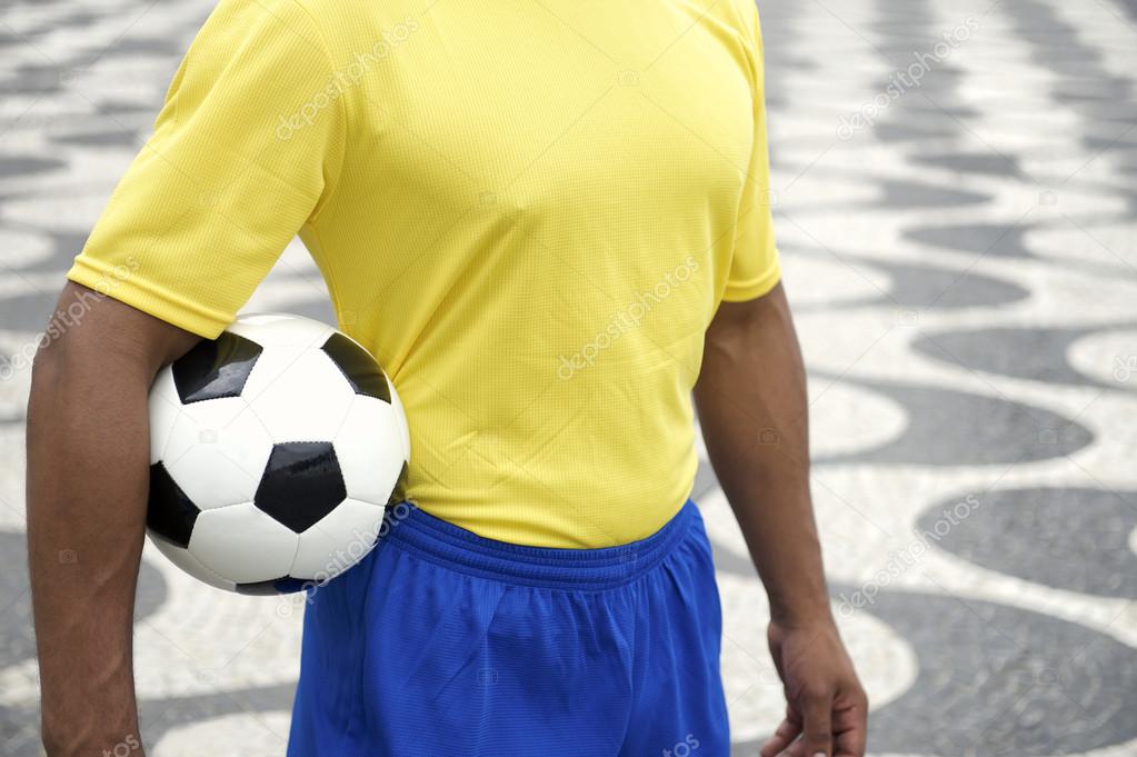 Brazilian Football Player in Uniform Holding Soccer Ball Rio
