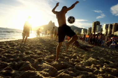 Carioca Brazilians Playing Altinho Futebol Beach Football clipart
