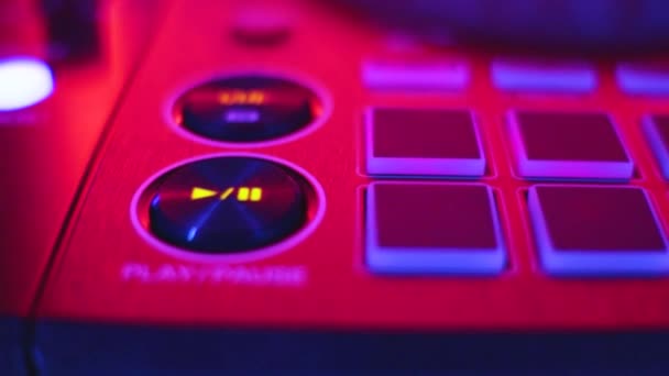 DJ mix studio audio tracks mixing buttons pads decks mixing console frequencies — Stock Video