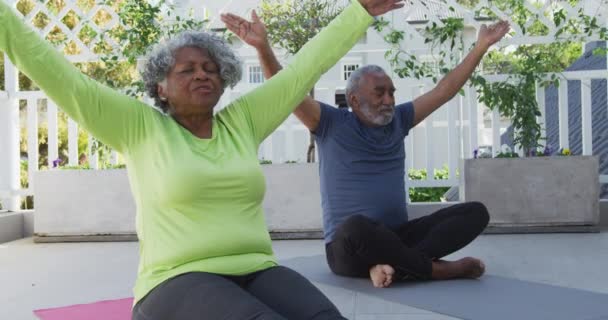 Animation Relaxed African American Senior Couple Practicing Yoga Mat Patio — Stock Video