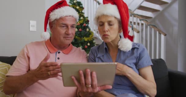 Animation Happy Caucasian Senior Couple Having Video Call Christmas Time — Stock Video