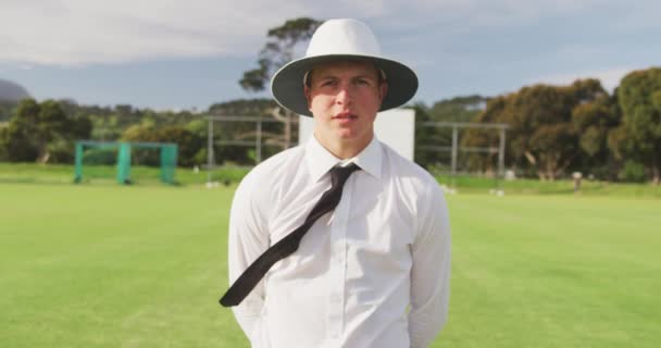 Portrait Confident Caucasian Male Cricket Umpire Wearing White Shirt Black — Stock Video