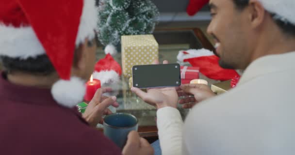 Biracial Adult Son Senior Father Santa Hats Making Smartphone Christmas — Stock Video
