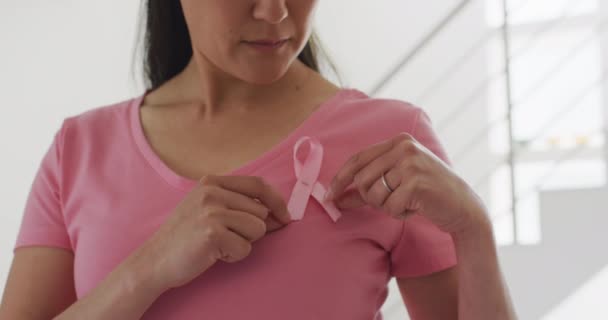 Happy Asian Woman Pink Tshirt Showing Pink Ribbon Home Health — Stock Video