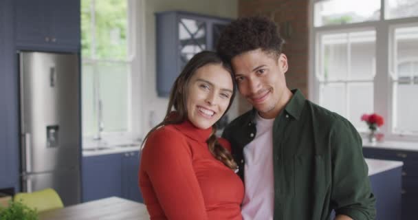 Portrait Happy Biracial Couple Embracing Smiling Kitchen Quality Time Relaxing — Stock Video