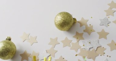 Decorations and stars on white background at new year's eve. new year, new year's eve party, festivity and celebration concept.