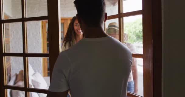 Back View Latin Man Welcoming Friends Entryway Hanging Out Friends — Stock Video