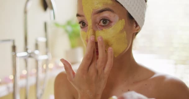 Portrait Biracial Woman Looking Mirror Applying Face Mask Beauty Wellness — Stock Video