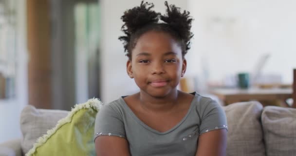 Portrait Happy African American Girl Sitting Sofa Smiling Domestic Life — Stock Video