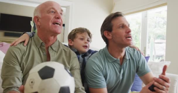 Happy Caucasian Grandfather Adult Son Grandson Watching Supporting Living Room — Αρχείο Βίντεο