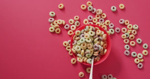 Video Colorati Cereali Colazione Con Ciotola Cucchiaio Sfondo Rosa Colazione — Video Stock