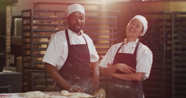 Animation Happy Diverse Male Female Bakers Looking Camera Working Bakery — Wideo stockowe