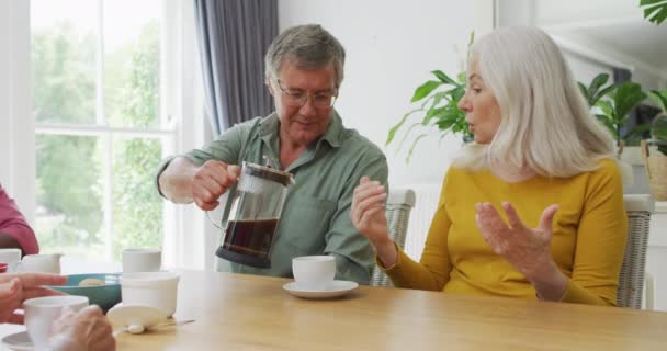 Animation Happy Caucasian Female Male Senior Friends Drinking Coffee Home — Stock Video
