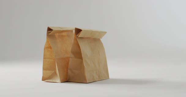 Animation Sacs Lunch Papier Sur Fond Blanc Nourriture Végétalienne Fraîche — Video