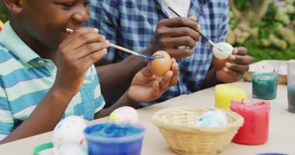 Animation Happy African American Father Son Painting Easter Eggs Together — 비디오