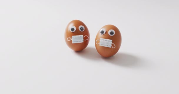 Video Eggs Eyes Face Masks White Surface Seasonal Easter Traditional — Stock Video