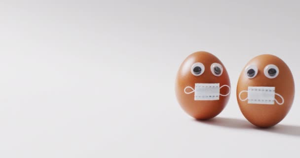 Video Eggs Eyes Face Masks White Surface Seasonal Easter Traditional — Stock Video