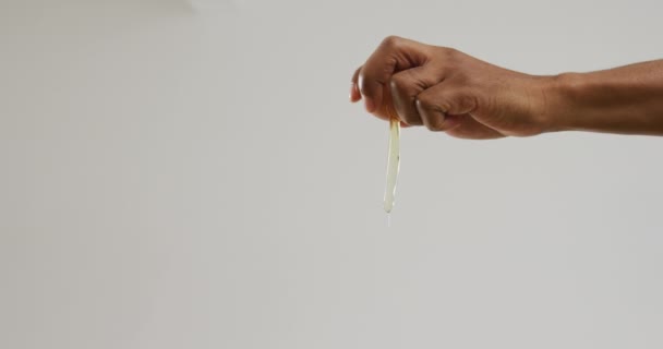 Video Hands Biracial Man Cracking Egg White Background Fusion Food — Stock Video