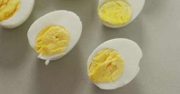 Video Close Halves Hard Boiled Eggs Grey Background Fusion Food — Stock Video