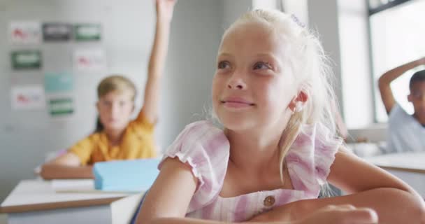 Video Happy Caucasian Girl Raising Hand Lesson Classroom Primary School — стоковое видео