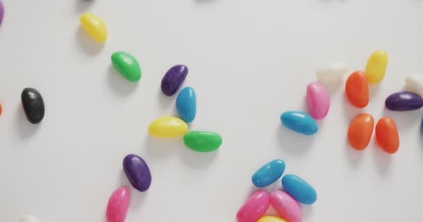 Video Close Multi Coloured Sweets Spinning White Background Fusion Food — Stockvideo