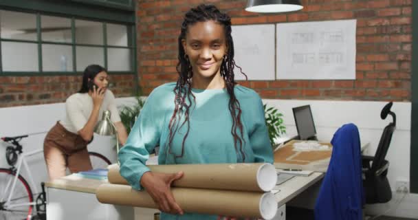 Portrait Happy African American Female Architect Holding Architectural Blueprints Office — Stok Video