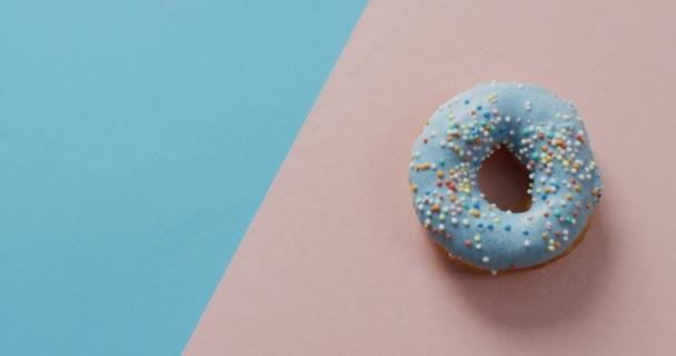 Video Donut Icing Blue Pink Background Colourful Fun Food Candy — Stock Video