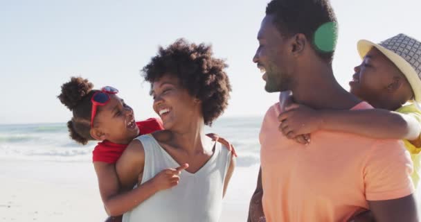Smiling African American Family Carrying Embracing Sunny Beach Healthy Active — Stockvideo