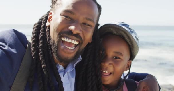 Video Happy African American Father Son Helmet Taking Selfie Outdoors — стоковое видео