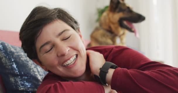 Portrait Caucasian Woman Smiling Lying Couch Her Dog Home Pet Stock Video