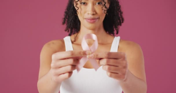 Video Smiling Biracial Woman Holding Pink Breast Cancer Ribbon Global — ストック動画