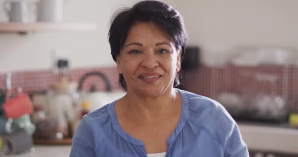 Portrait Smiling Senior Biracial Woman Kitchen Alone Healthy Active Retirement — Vídeo de stock